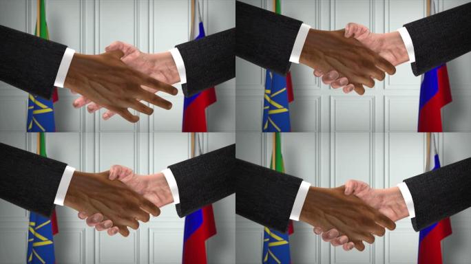 埃塞俄比亚与俄罗斯协议握手，政治例证。正式会议或合作，商务见面。商人和政客握手