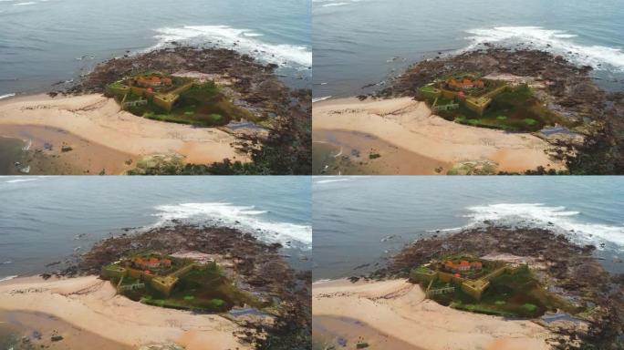 4k在海滩上的一座堡垒的空中拍摄