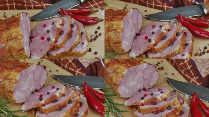 在木制切菜板上，切成薄片的多汁猪肉火腿，雕刻刀，红辣椒，多色多香果，欧芹，莳萝和罗勒。全景特写。美味