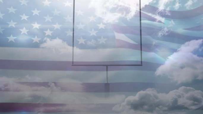 美国国旗在美国足球基地和云层的动画