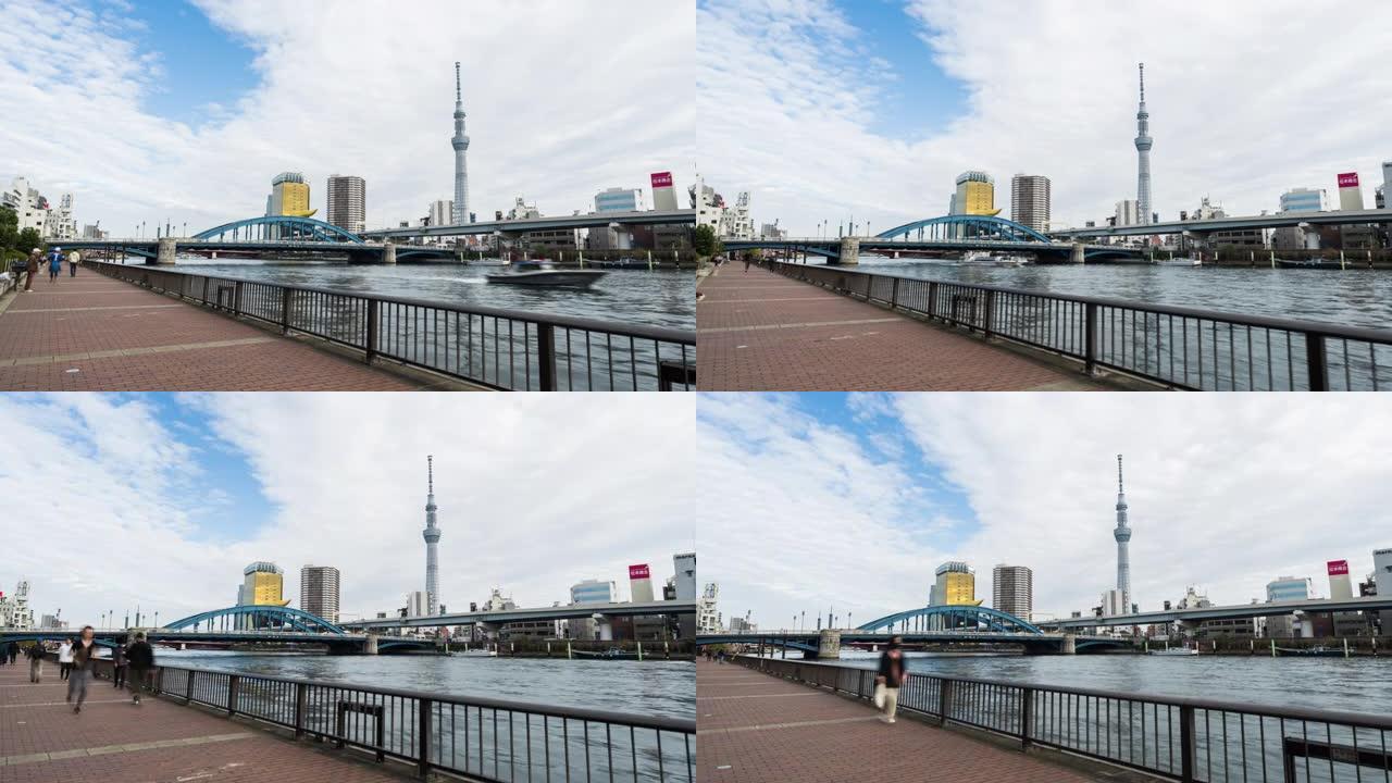 在Sumida河，日本浅草的汽车交通，东京Skytree城市景观景观中行走的人的过度延时。亚洲旅游地