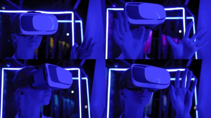 在黑暗互动虚拟现实展览会上使用虚拟现实耳机的年轻女子
