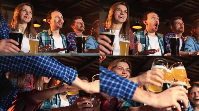 一群年轻人，男人和女人在酒吧看比赛，喝啤酒。球迷情绪激动地为运动队加油。庆祝获胜游戏