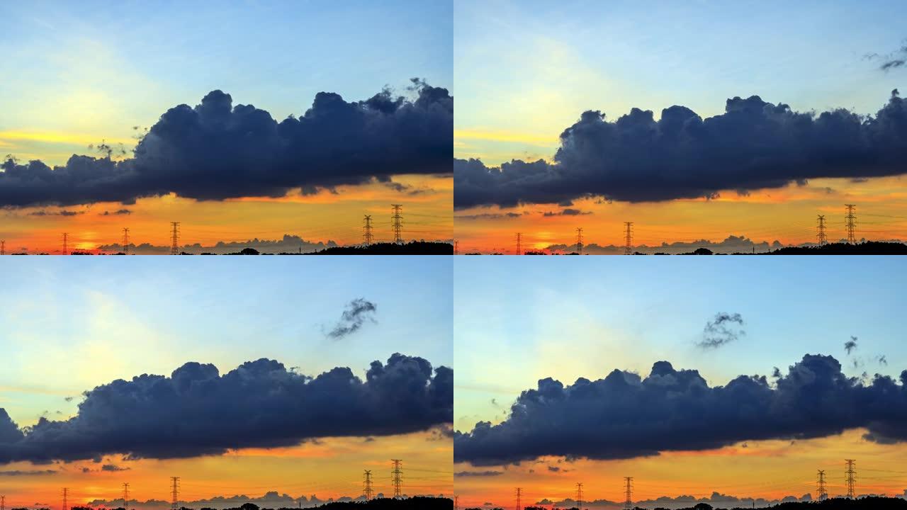 天空中滚动的乌云，日落时的天空云和电力塔。