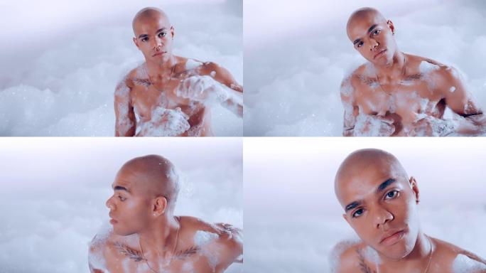 英俊的肌肉非洲种族男子放松在洗澡。在泡泡云上练习自我护理和健康