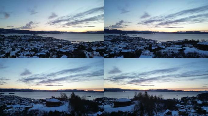 挪威比约纳夫乔德和奥索罗港上空的日出