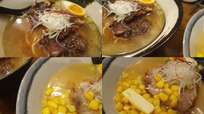 Pan shot北海道黄油玉米和牛肉拉面日本热面条汤慢动作视频
