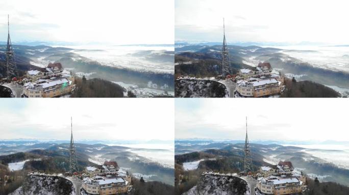 冬季下午朦胧的Uetliberg观景塔的访客。