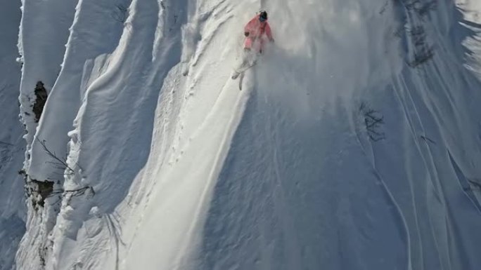 运动员滑雪者极限运动自由滑行下坡降落雪檐口山