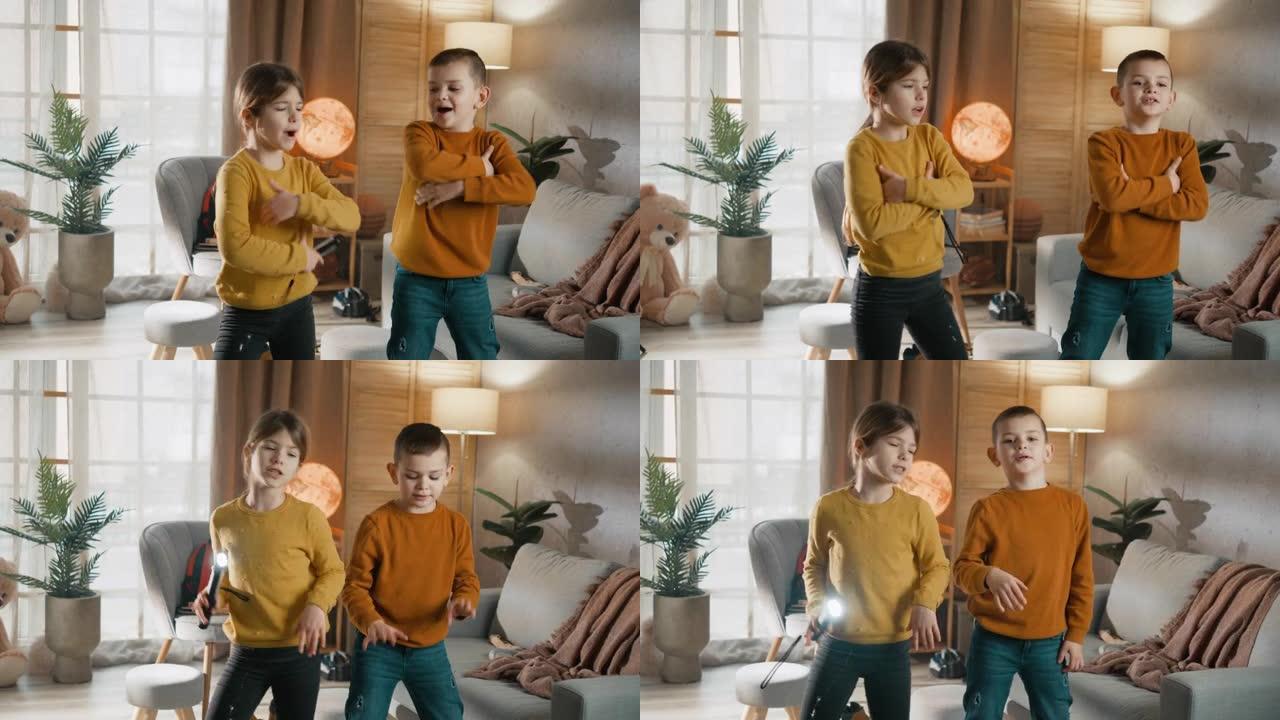 两个孩子小男孩和女孩为社交媒体账户录制时髦的舞蹈动作