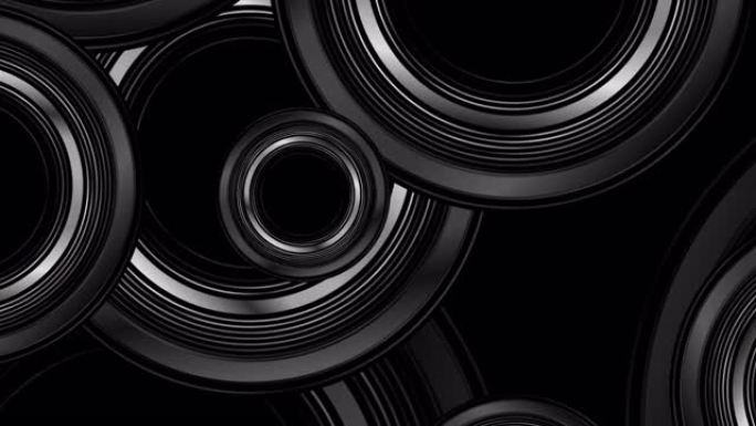 黑色和灰色金属圈抽象技术几何运动背景