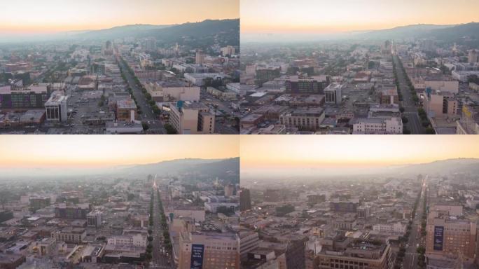好莱坞星光大道上的日落从上方看到美国加利福尼亚州洛杉矶，无人机向后运动