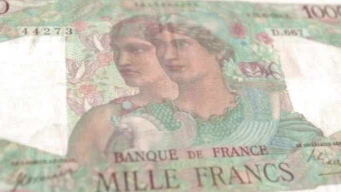 法国法国法郎1000纸币，一千法国法郎，法国法郎的特写和宏观视图，跟踪和多莉拍摄1000法国法郎纸币