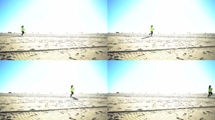 圣莫尼卡海滩，女人在远处奔跑