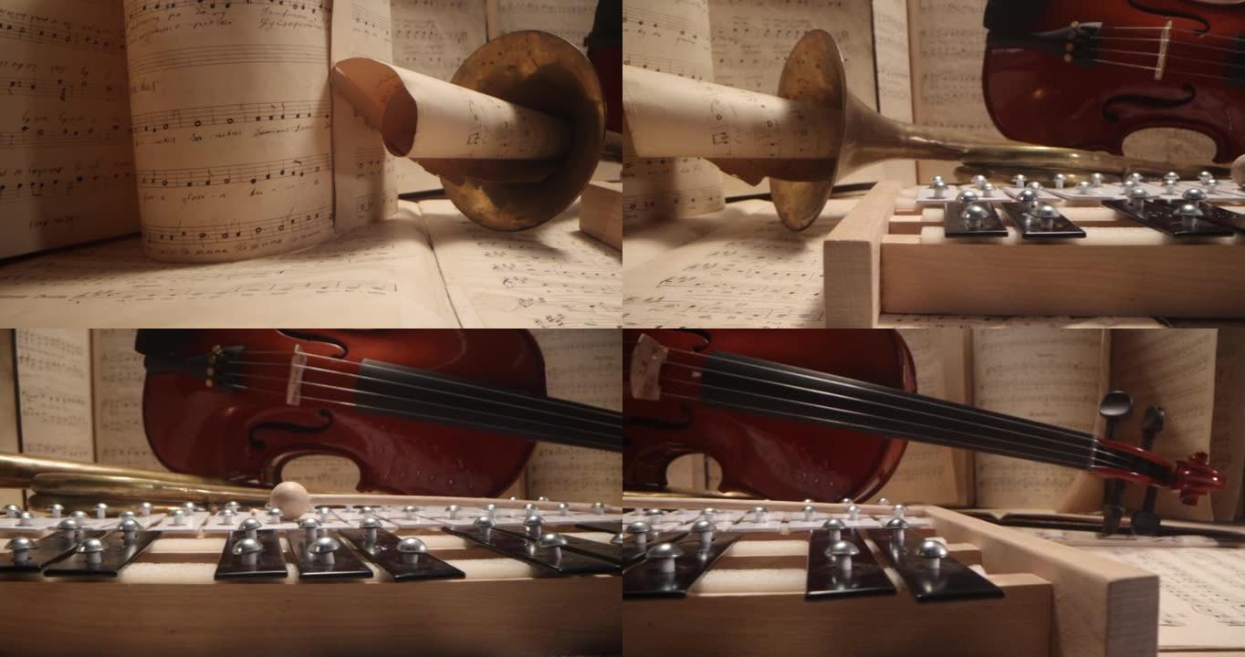 乐器和艺术。在音符背景上特写小提琴、小号、钹。经典音乐、音乐文化和娱乐