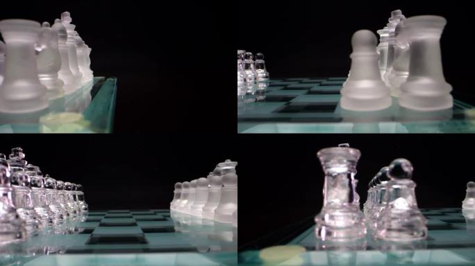 黑色背景的玻璃棋盘。准备玩游戏的小兵。宏观的观点。