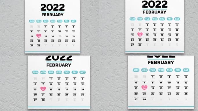 放大日历2022和情人节的美丽2月页面，上面标有跳动的心脏的粉红色符号