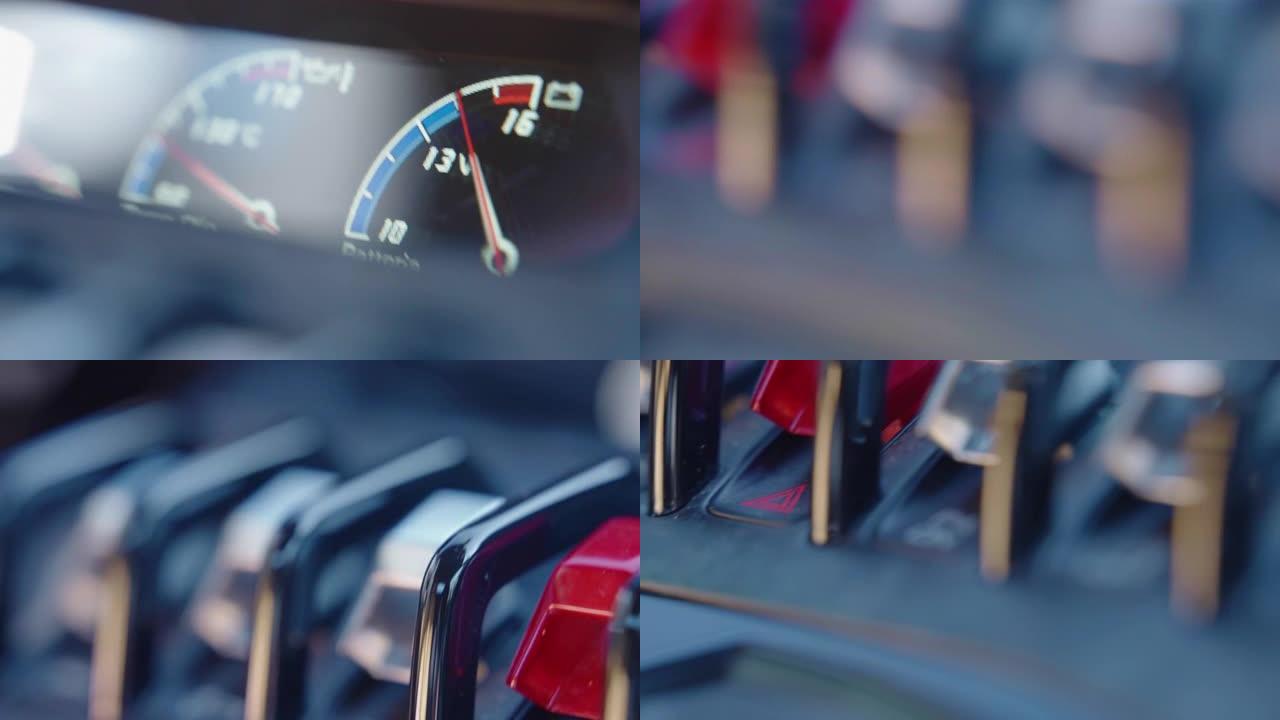 带有其他不同图标，按钮和指示器的跑车的照明仪表板速度计的特写镜头，显示运动中的油压和电池电量的红色箭