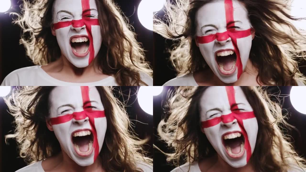 脸上挂着英国国旗的女球迷对着镜头尖叫