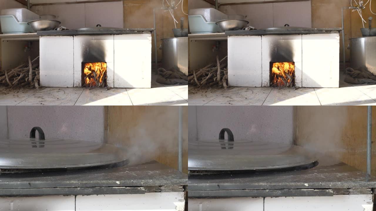 炊具炉正在做饭，散发热蒸汽。