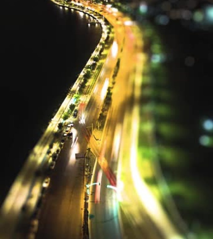 汽车交通运输城市的超限延时。无人机鸟瞰图。公共交通或通勤城市生活概念