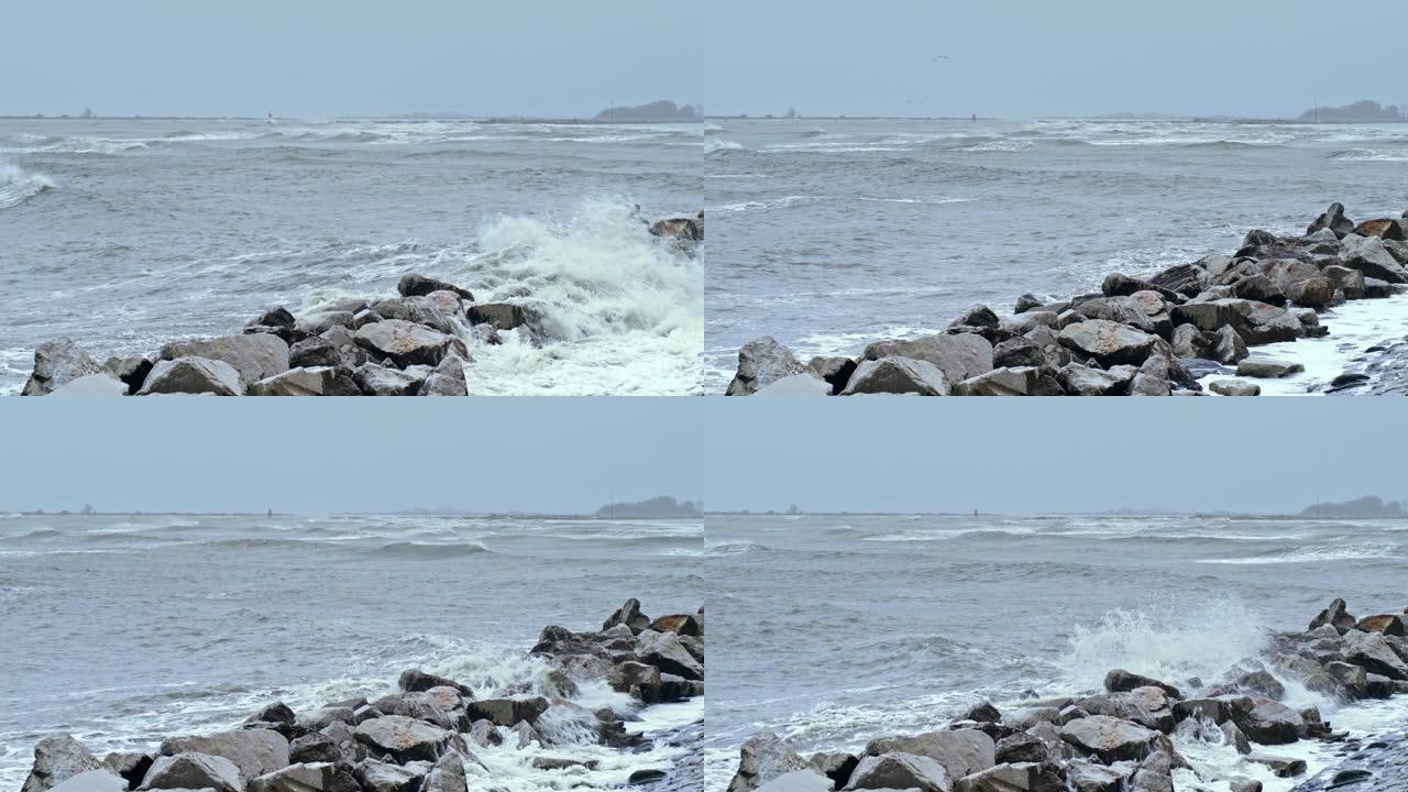 在暴风雨的日子里，LD海浪冲向防波堤