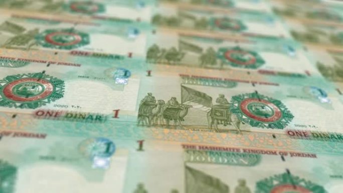 约旦第纳尔印刷机打印出当前第纳尔钞票，无缝循环，约旦货币背景，4K，聚焦深度Smoot和尼斯股票视频