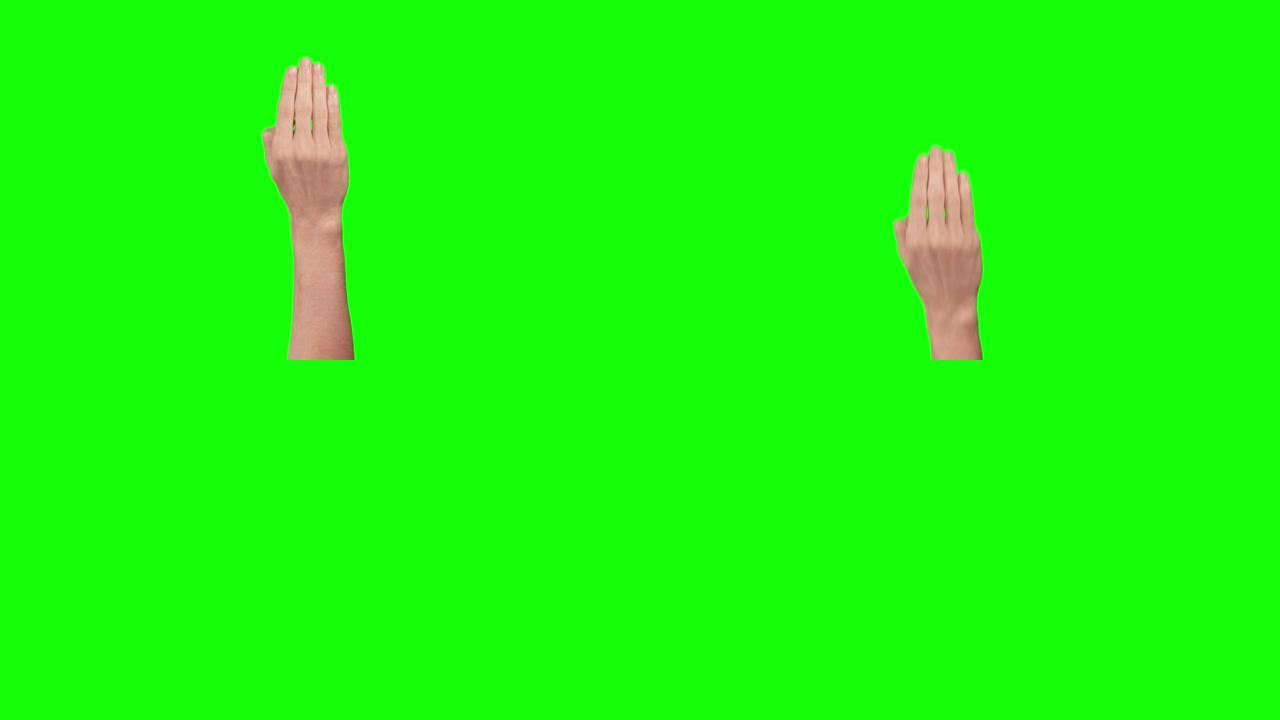 手4手指点击绿色屏幕背景。