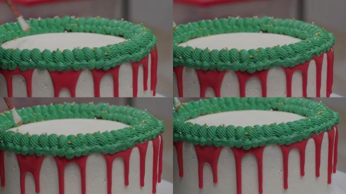 手工糕点厨师设计师浇筑磨砂白色蛋糕挤压红绿色滴灌袋4k视频