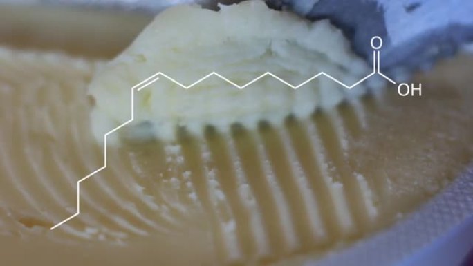 在顶部出现了散布黄油的刀，上面覆盖了脂肪酸和其他脂质的化学结构