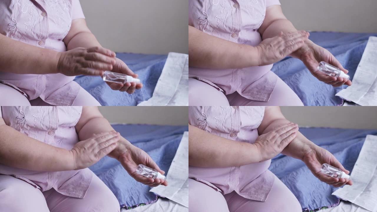 该妇女将雌激素喷雾剂涂在前臂的内部，然后将其摩擦到皮肤上。