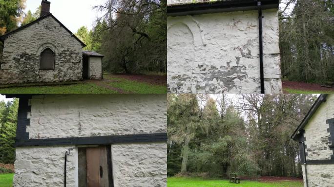 在北威尔士郁郁葱葱的绿色森林中被遗弃的石头小屋