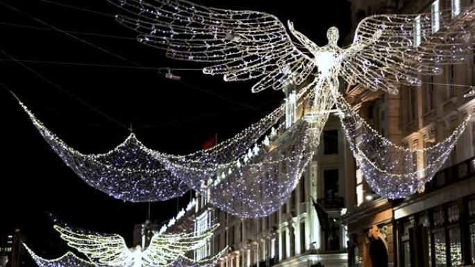 伦敦市中心摄政街上方的天使圣诞灯