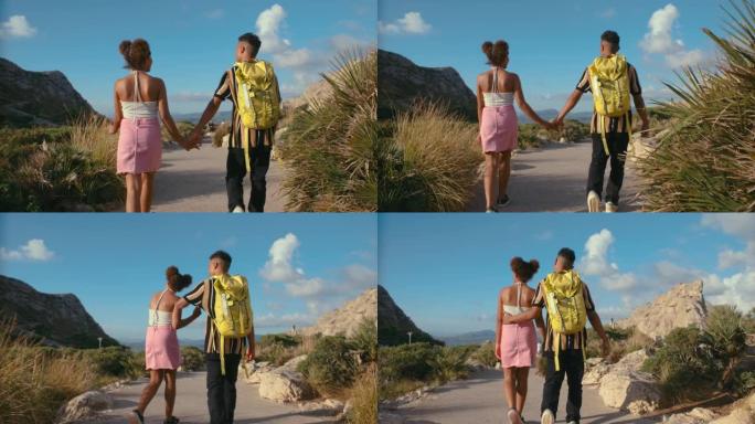 非洲族裔夫妇在旅游旅行中。暑假期间浪漫的约会时散步和观光