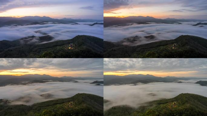 泰国亚拉省艾耶翁古农西里帕特视点的美丽日出与雾在山上滚动的延时