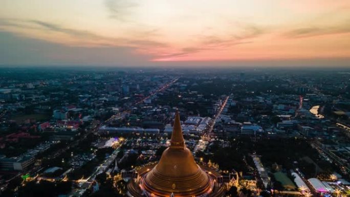 泰国佛统城大塔日落场景的空中延时