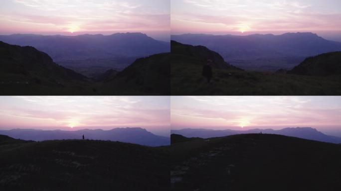空中无人机拍摄日落时的山脊线