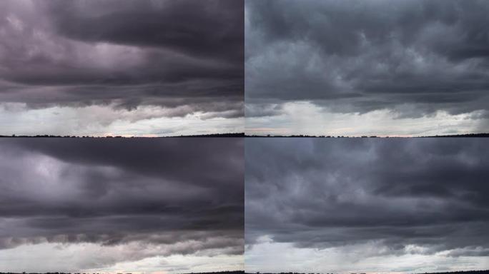 黑暗戏剧性的暴风雨天空的时间流逝，湖上快速移动的乌云