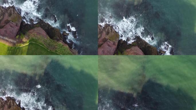 英格兰德文郡佩恩顿的仙女湾: 悬崖和大海的无人机鸟瞰图