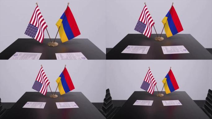 亚美尼亚和美国在谈判桌上达成外交协议。商业和政治动画。国旗，外交协议。桌上的纸质文件。国际协议。