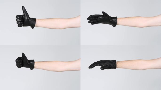 男人的手展示了一只黑色手套。侧视图。