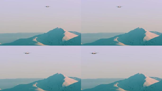 一架客机飞越山脉的绝对令人惊叹的电影镜头