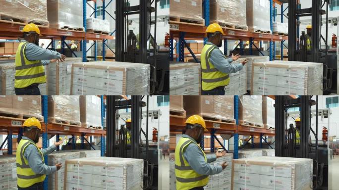 安全磨损的非洲仓库工人正在操作叉车堆垛机来移动包裹堆。