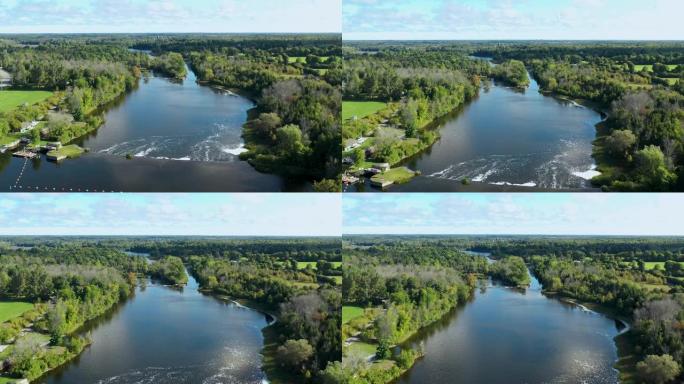 加拿大渥太华安大略省附近的里多河。田园诗般的宁静景象，绿树成荫，蓝天，平静的海水。
