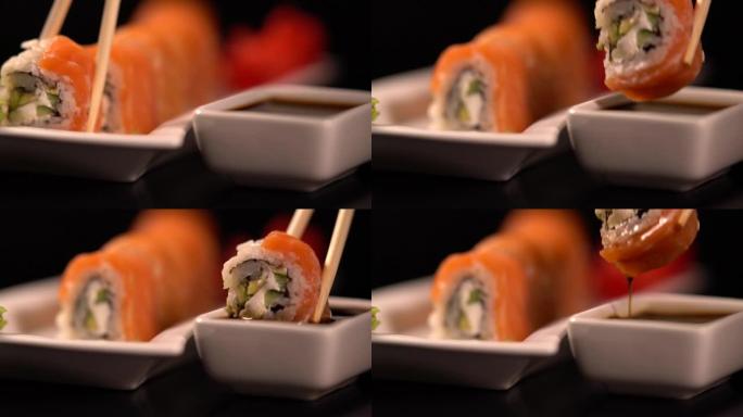 蘸酱油的筷子寿司卷