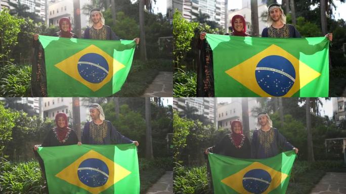 母子在户外举着巴西国旗