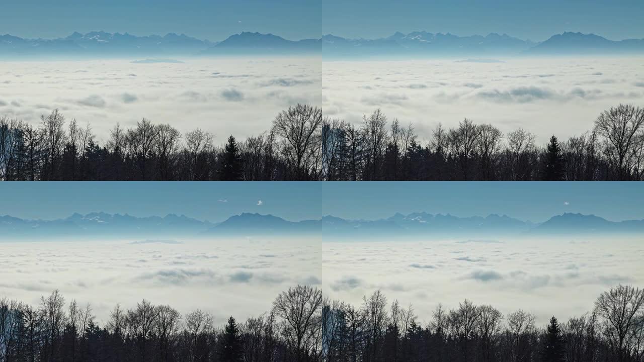时间流逝，山里的云湖。雾海。白雪覆盖的山丘。从阿尔比斯帕斯观看。苏黎世州阿尔比斯山脉的山口
