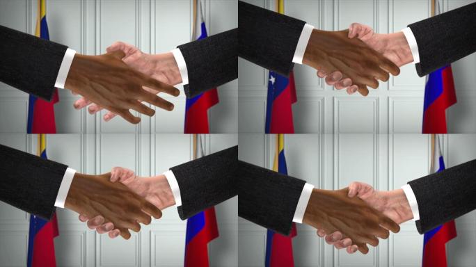 委内瑞拉和俄罗斯握手，政治例证。正式会议或合作，商务见面。商人和政客握手