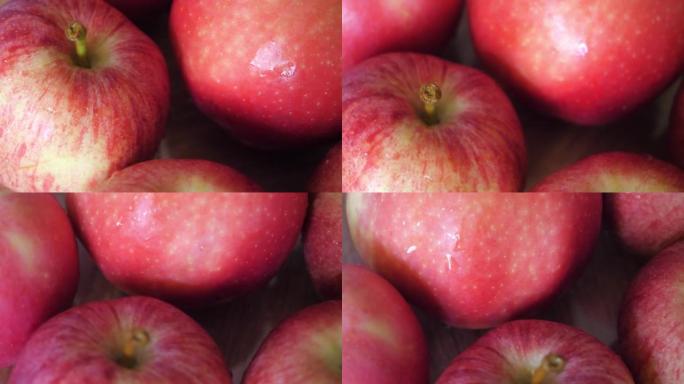 Ligol和Gala品种的几个红苹果，视频特写。