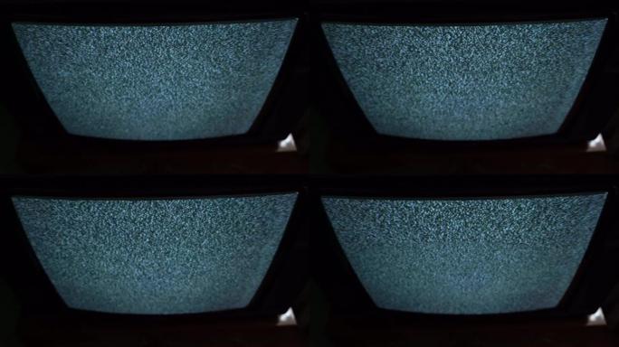 黑暗顶视图中电视屏幕上的白噪声